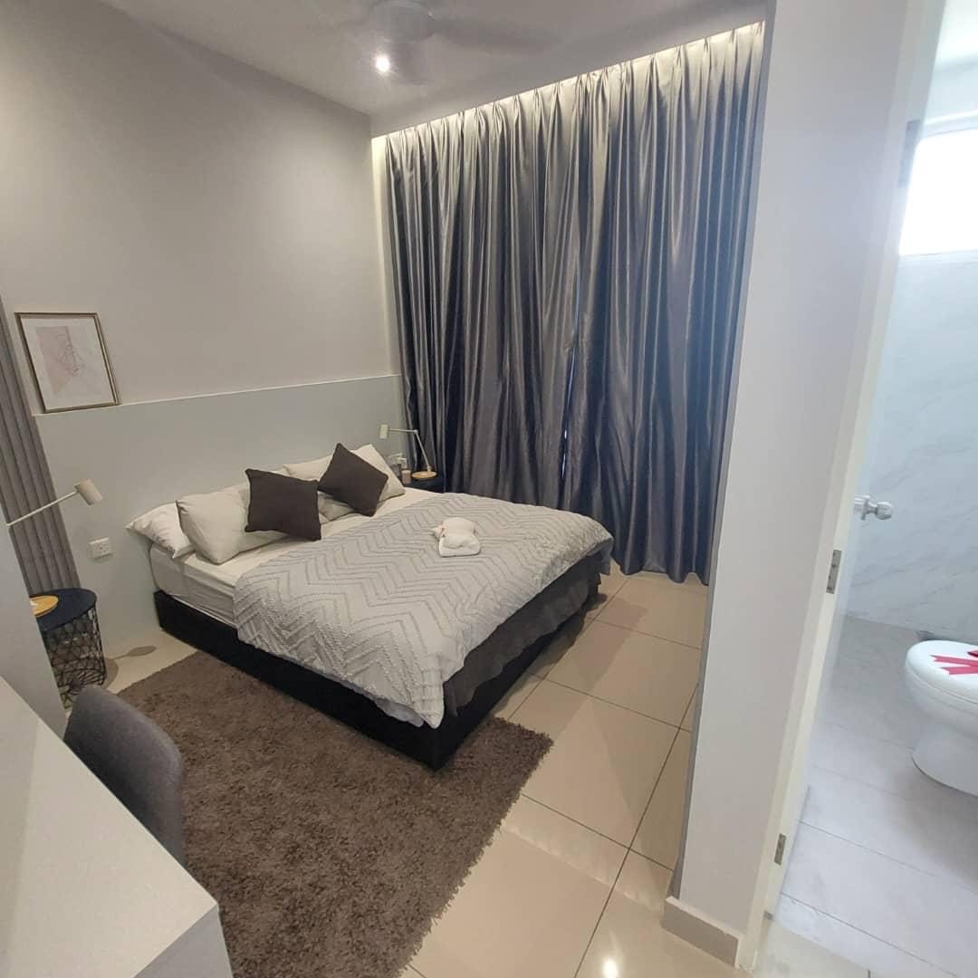 Actual photo — bedroom with attached bathroom