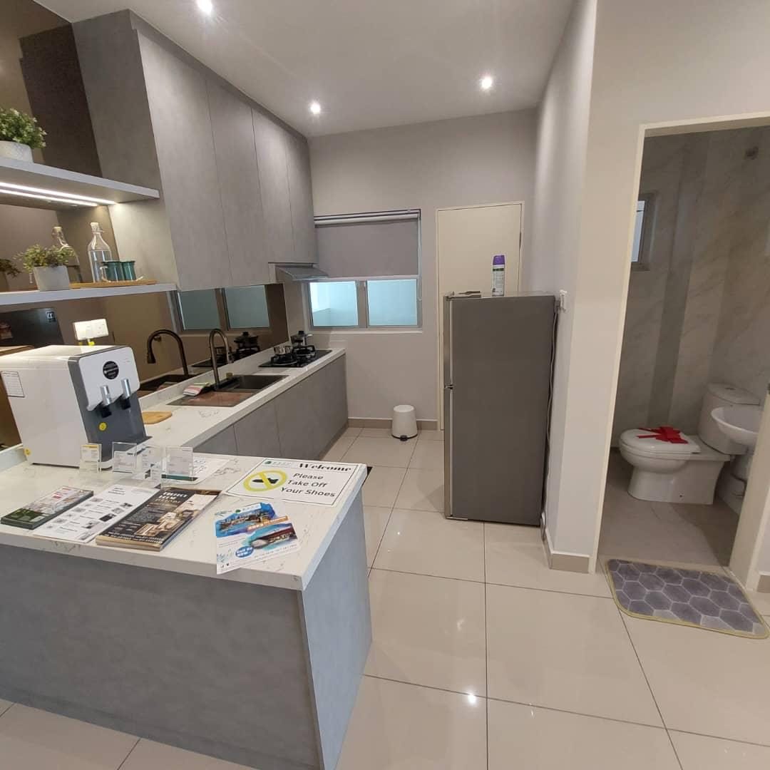 Actual photo — kitchen and bathroom entrance